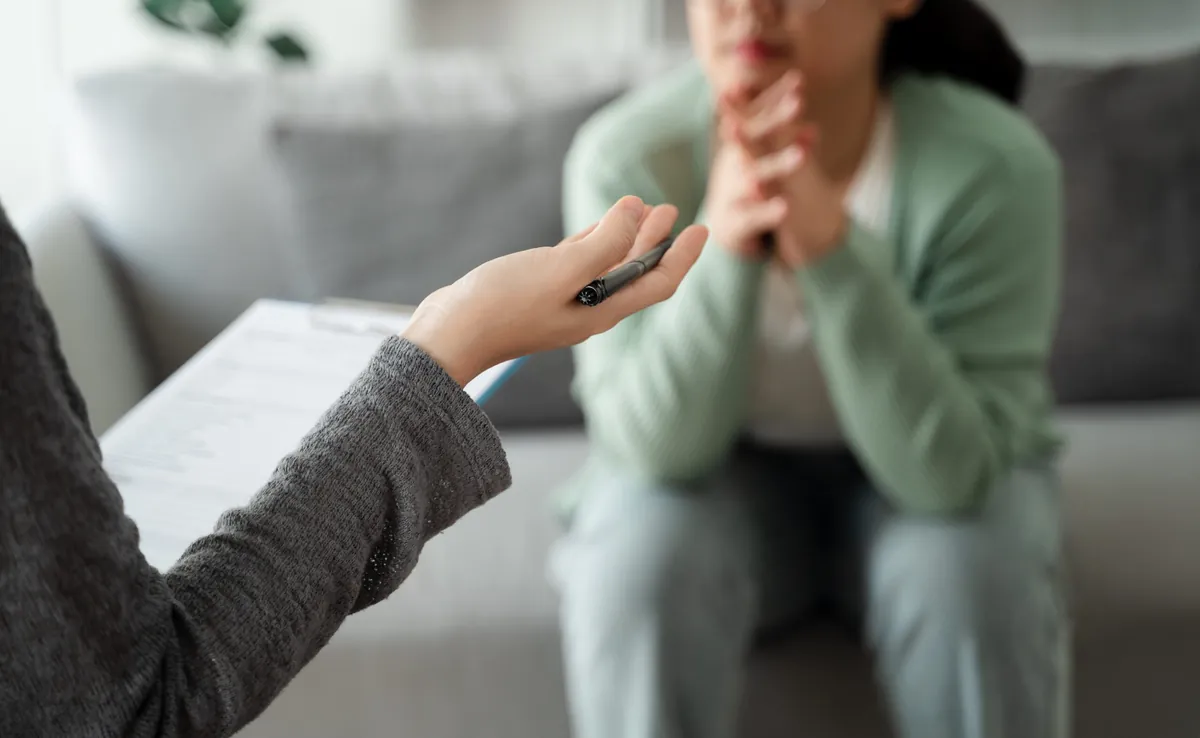 Psychologist doctor examine and listen and talking to patient with depression, anxiety, therapy session, mental health concept